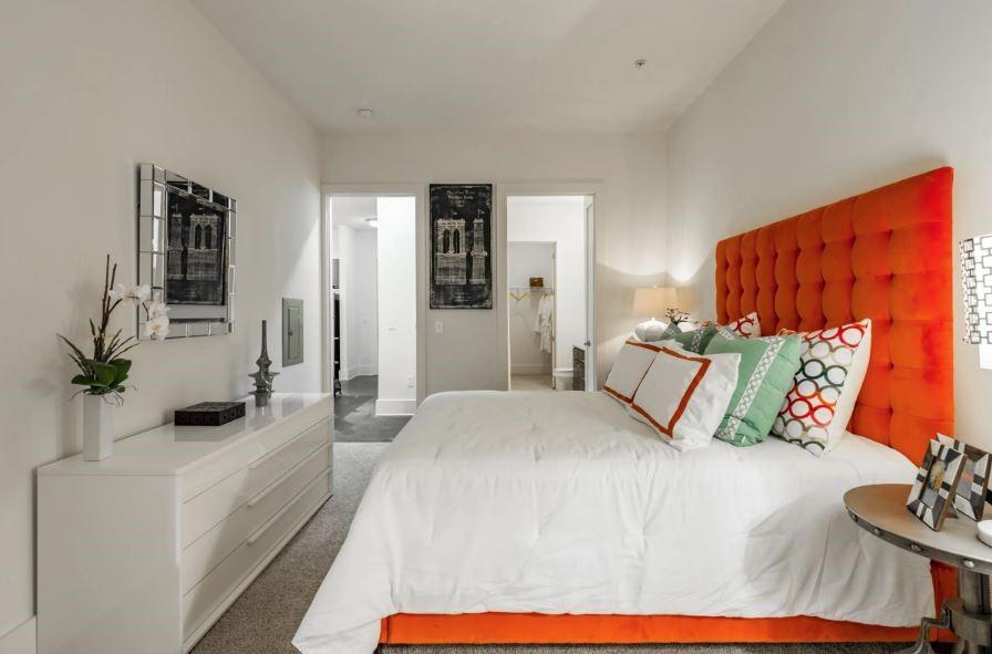 1391 Collier Road Northwest, Unit 2105 Atlanta, GA 30318 - Photo 11 of 43 a bedroom with bed and window