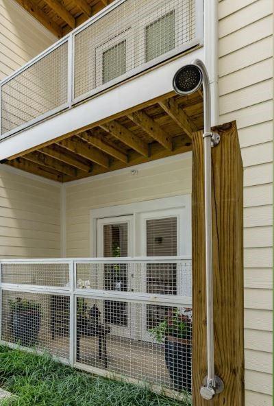 1391 Collier Road Northwest, Unit 2105 Atlanta, GA 30318 - Photo 16 of 43 a front view of a house with plants