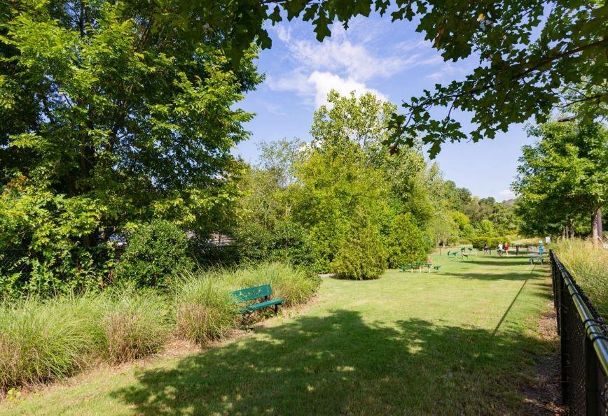 1391 Collier Road Northwest, Unit 2105 Atlanta, GA 30318 - Photo 22 of 43 a view of yard from outdoor space