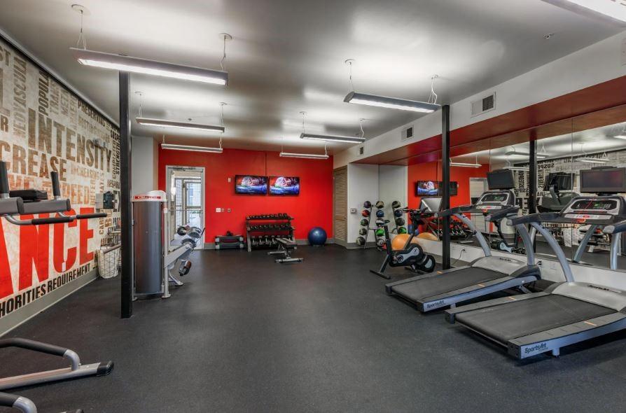 1391 Collier Road Northwest, Unit 2105 Atlanta, GA 30318 - Photo 36 of 43 a view of a room with gym equipment