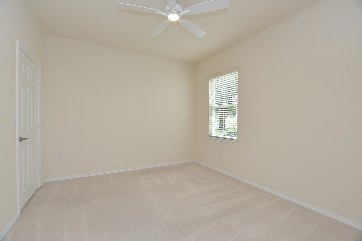 203 Winter Drive Georgetown, TX 78633 - Photo 23 of 29 One of two guest bedrooms