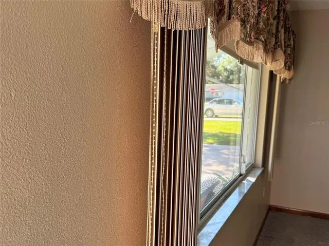 a view of balcony and window