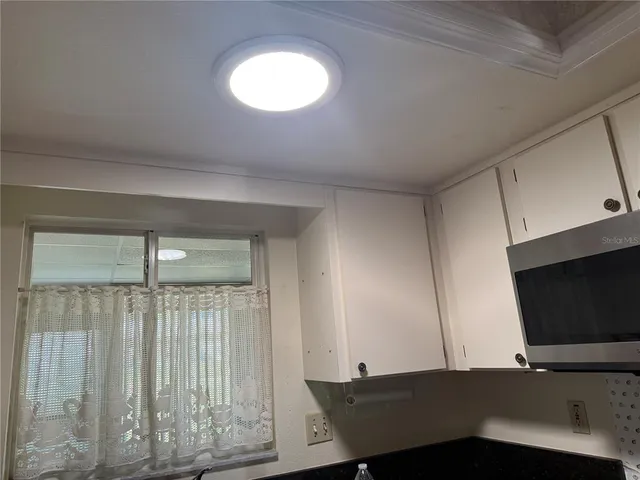 a view of a workspace with furniture