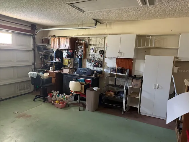 a room with storage and utility room