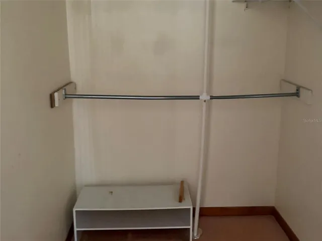 a view of small space with racks on the wall