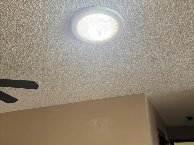 a view of a hallway with a chandelier