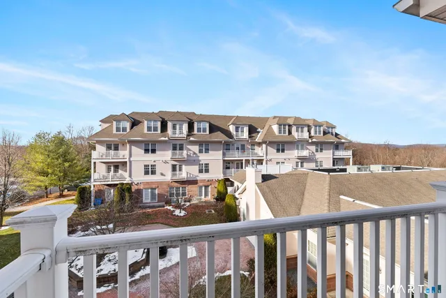 a view of a building from a balcony