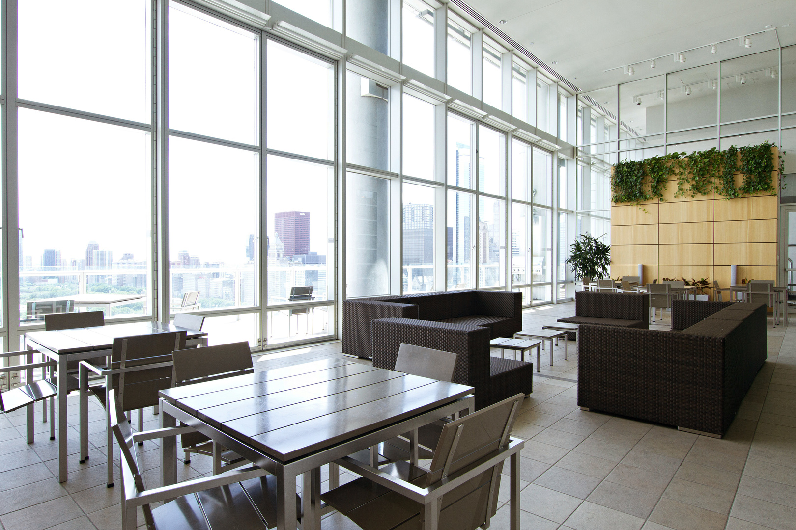 340 East Randolph Street, Unit 1803 Chicago, IL 60601 - Photo 17 of 19 a living room with furniture and large windows