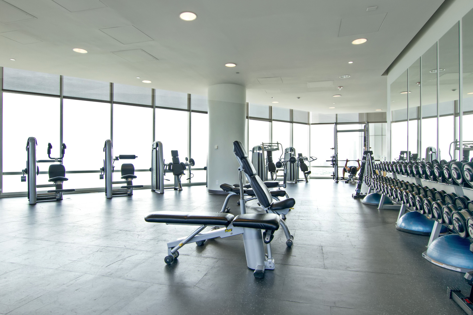 340 East Randolph Street, Unit 1803 Chicago, IL 60601 - Photo 19 of 19 a gym room with lots of chairs and view of living room