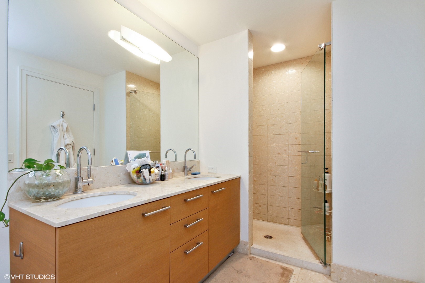 340 East Randolph Street, Unit 1803 Chicago, IL 60601 - Photo 10 of 19 a bathroom with a double vanity sink and a mirror
