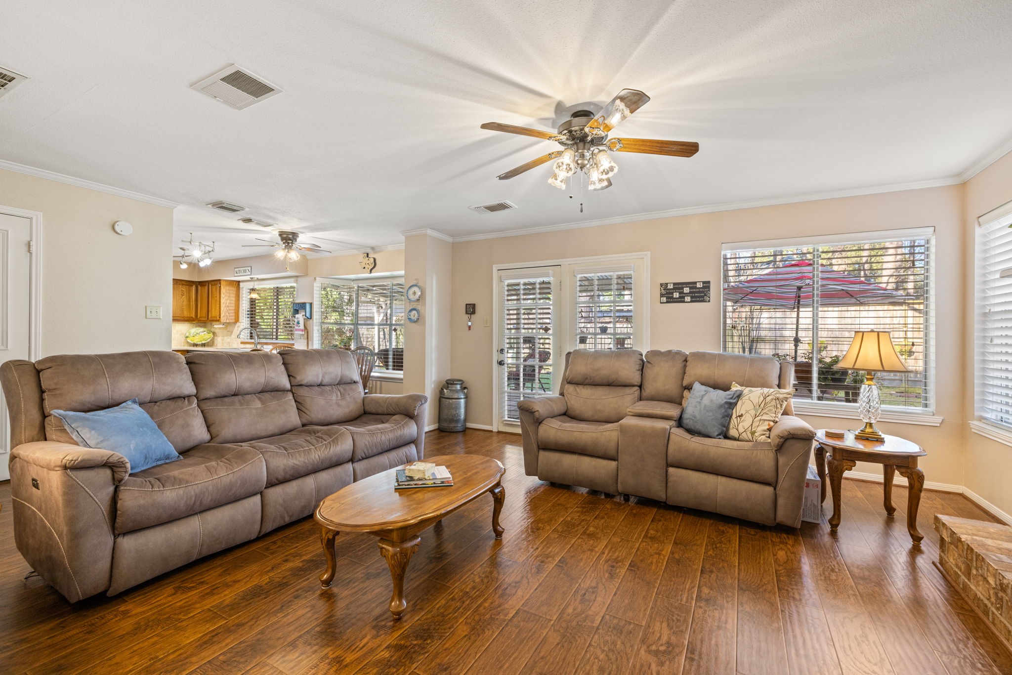 9102 Woodhouse Drive Spring, TX 77379 - Photo 13 of 32 FAMILY ROOM - So many windows providing beautiful views to the back yard!