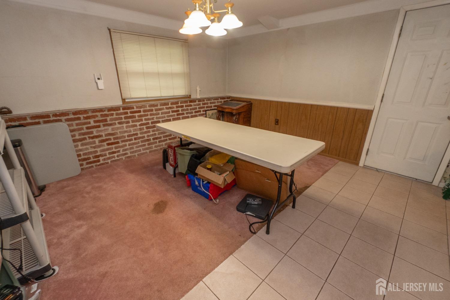 73 Wellington Road East Brunswick, NJ 08816 - Photo 25 of 39 a room with storage and utility