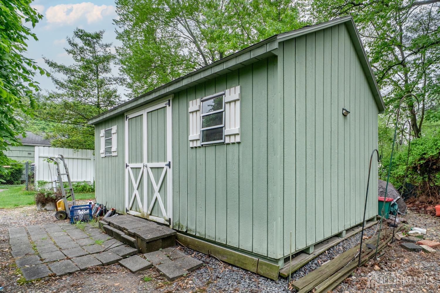 73 Wellington Road East Brunswick, NJ 08816 - Photo 34 of 39 a backyard of a house with seating space