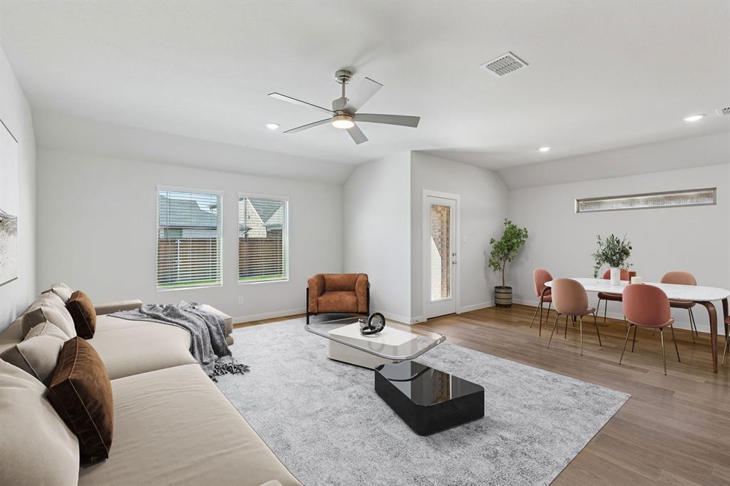 769 Sierra Ridge Lavon, TX 75166 - Photo 11 of 37 Living Room in the Harrison home plan by Trophy Signature Homes – REPRESENTATIVE PHOTO
