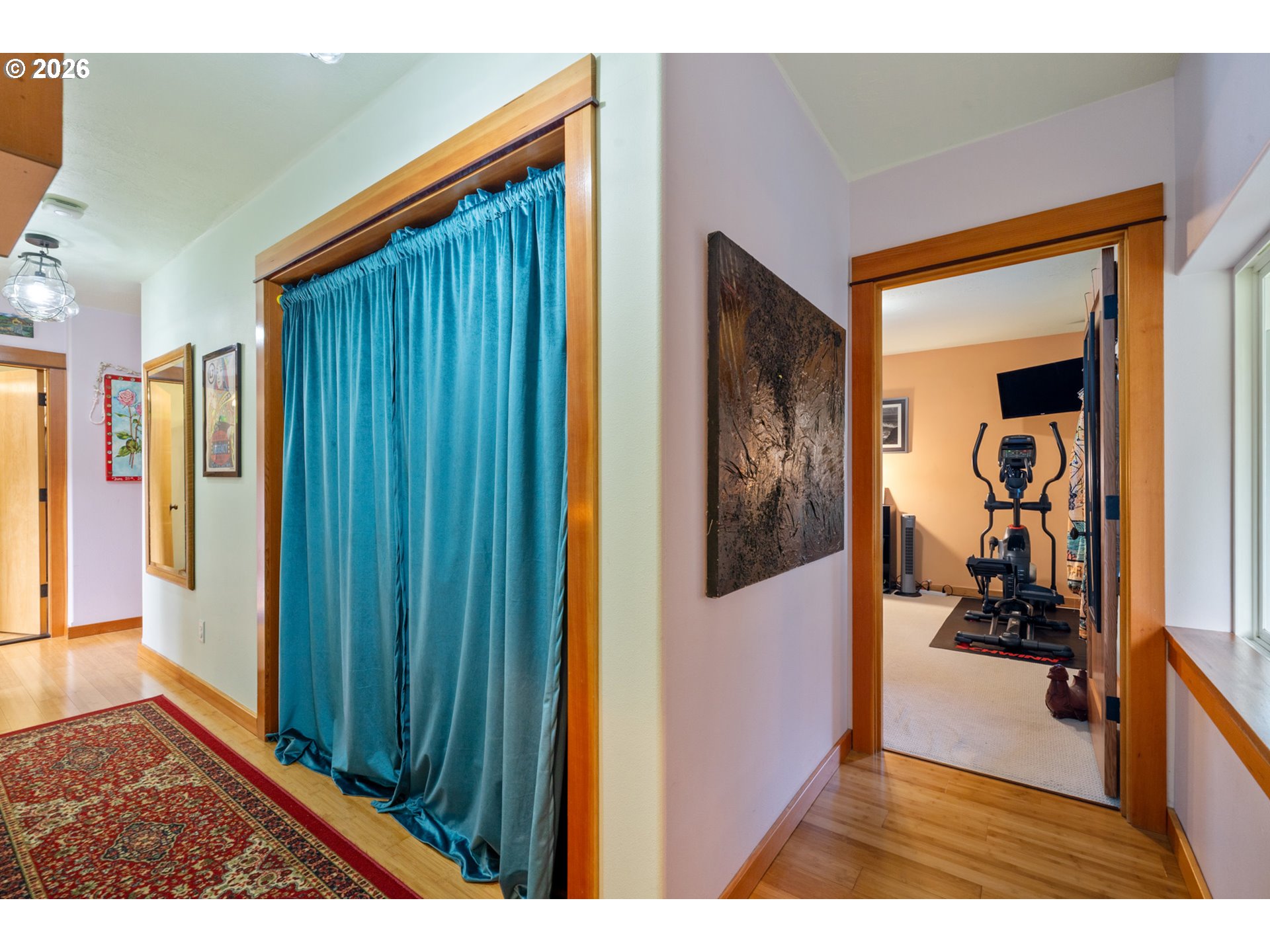 1055 Phelps Street Tillamook, OR 97141 - Photo 11 of 40 a view of a hallway and a livingroom with furniture