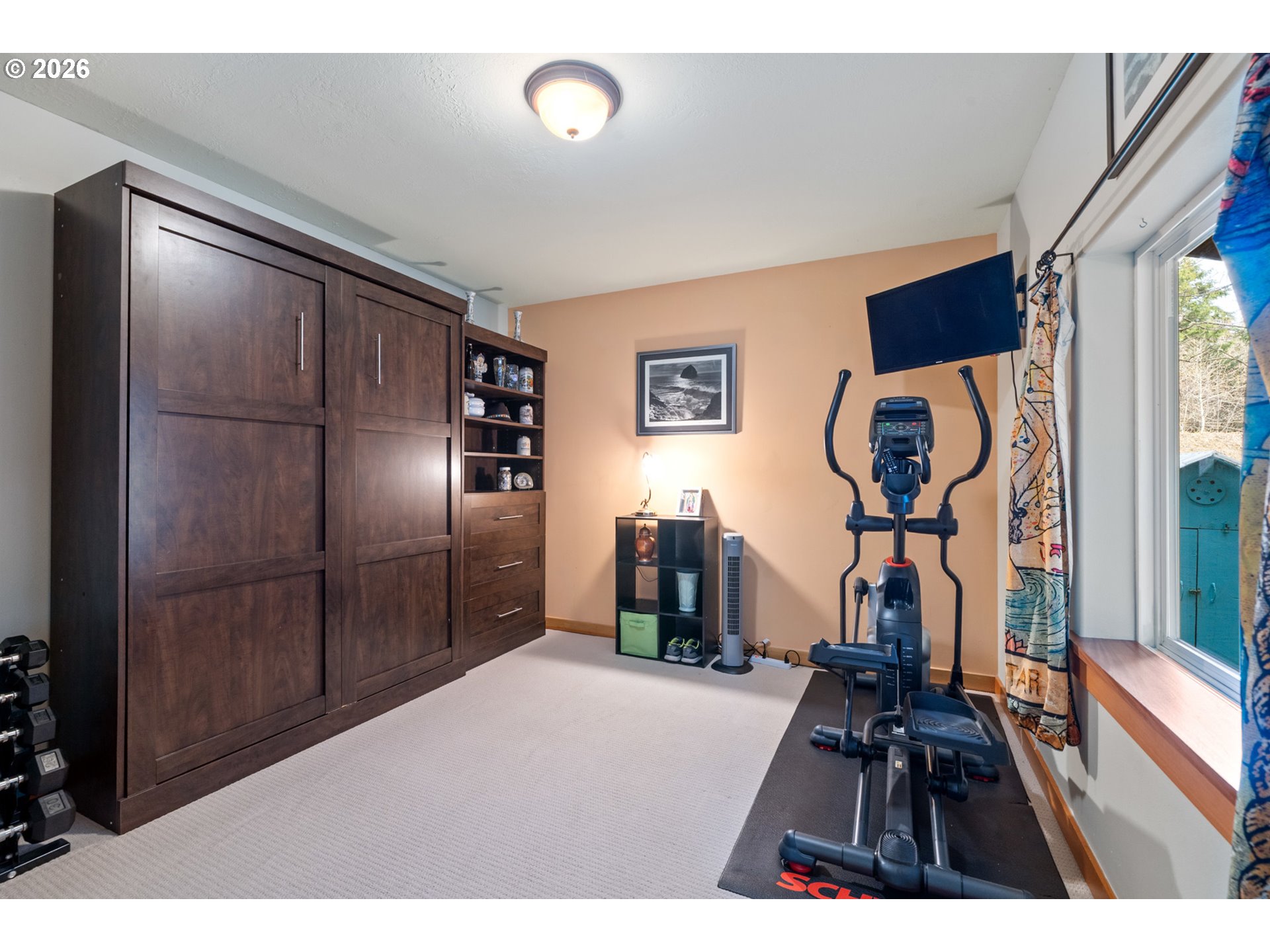 1055 Phelps Street Tillamook, OR 97141 - Photo 12 of 40 a picture of a living room and bathroom