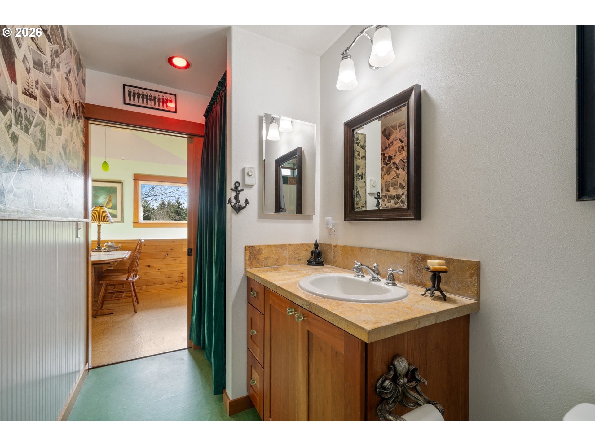 1055 Phelps Street Tillamook, OR 97141 - Photo 23 of 40 a bathroom with a sink and a mirror