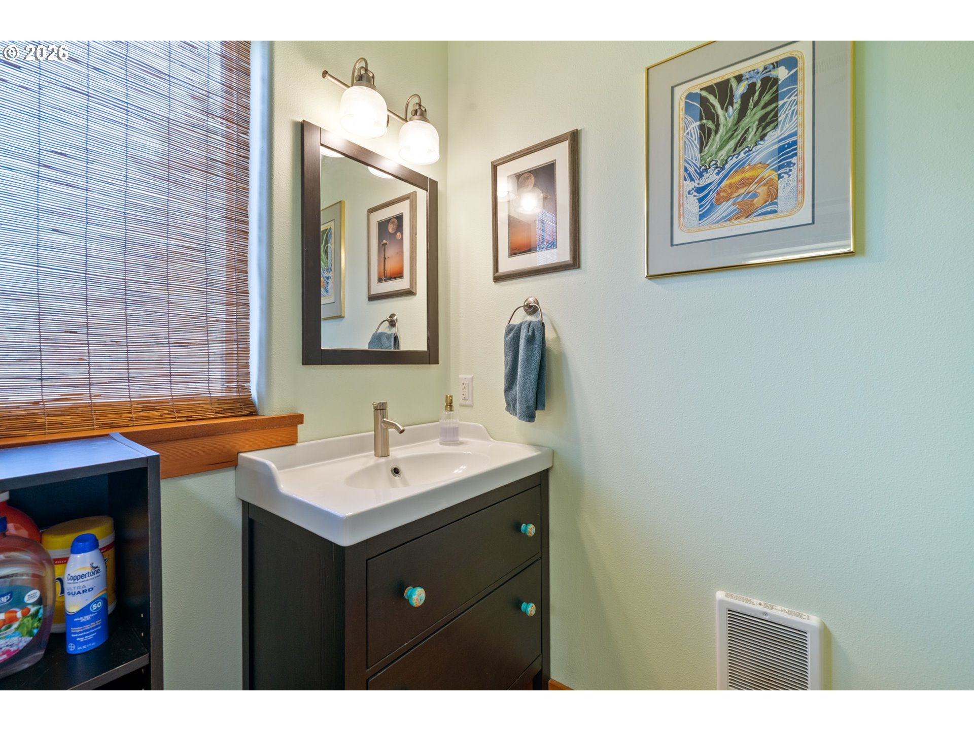 1055 Phelps Street Tillamook, OR 97141 - Photo 7 of 40 a bathroom with a sink and a mirror