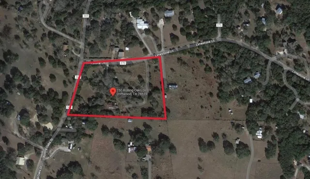 a view of a house with a tree