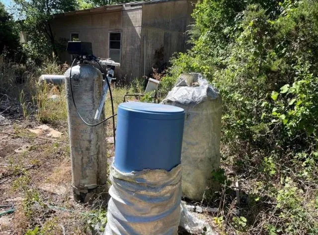 a view of an outdoor space with a tree