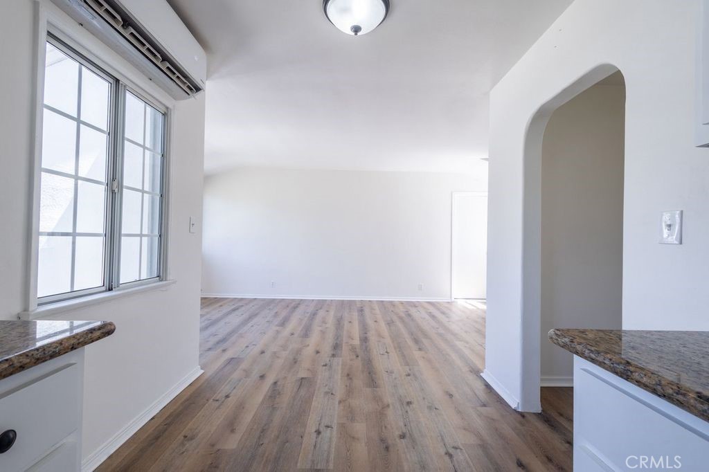 310 Wyland Way Duarte, CA 91010 - Photo 5 of 20 wooden floor in an empty room with a window