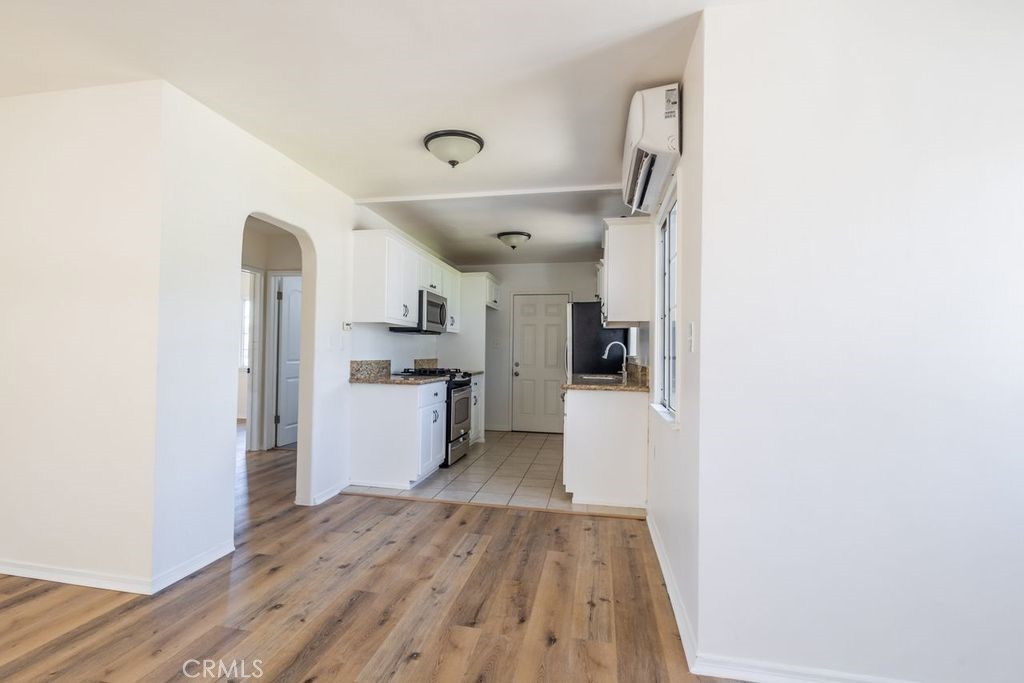 310 Wyland Way Duarte, CA 91010 - Photo 8 of 20 a kitchen with stainless steel appliances granite countertop a refrigerator and a sink