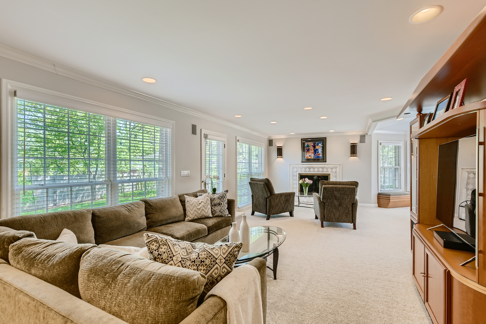 506 Warwick Road Deerfield, IL 60015 - Photo 14 of 34 a living room with furniture flat screen tv and large window