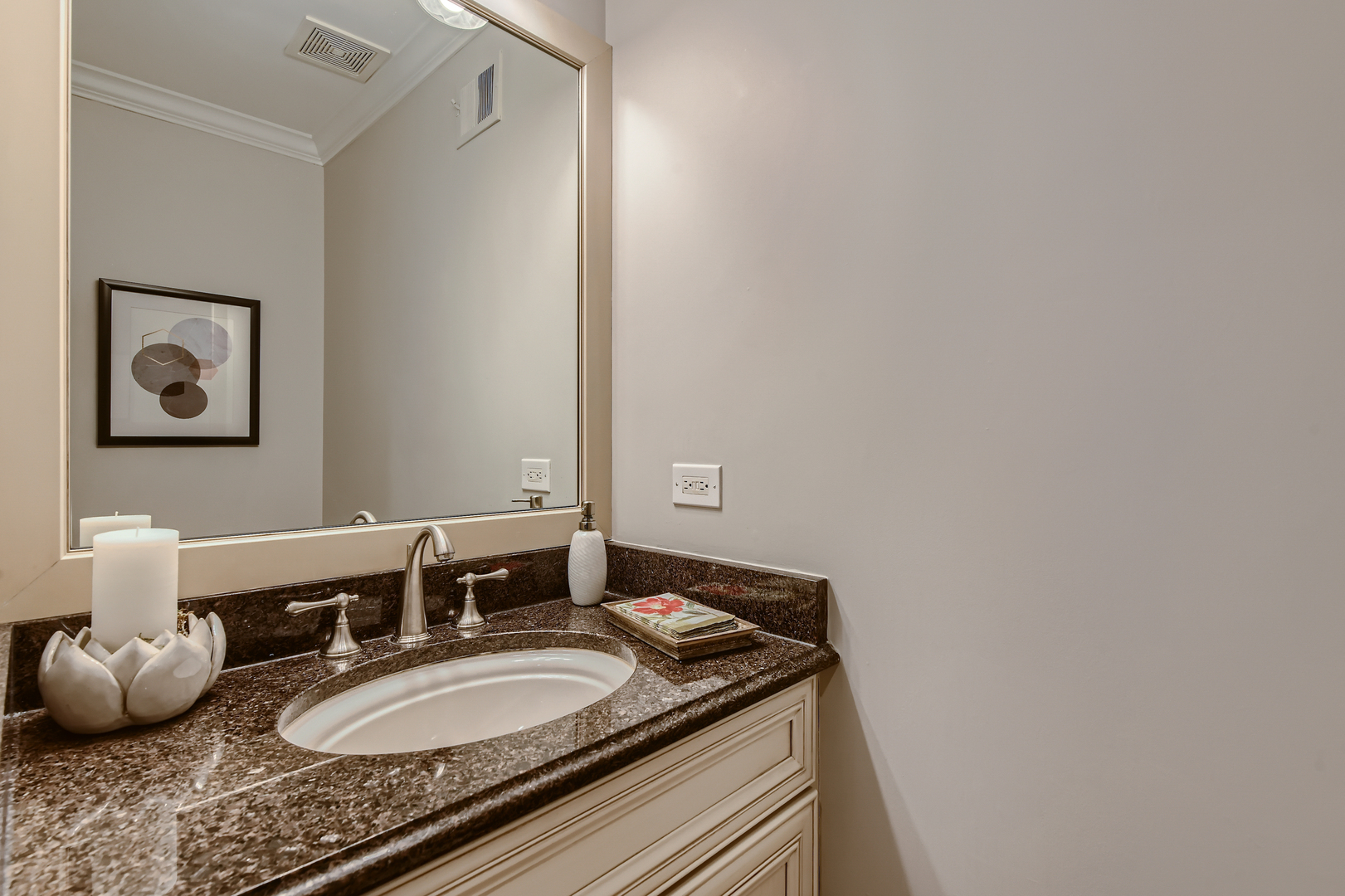 506 Warwick Road Deerfield, IL 60015 - Photo 17 of 34 a bathroom with a granite countertop sink and a mirror