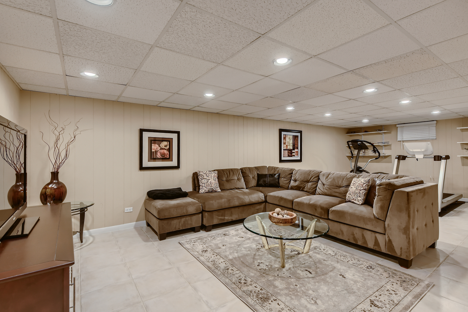 506 Warwick Road Deerfield, IL 60015 - Photo 25 of 34 a living room with furniture a couch and a flat screen tv