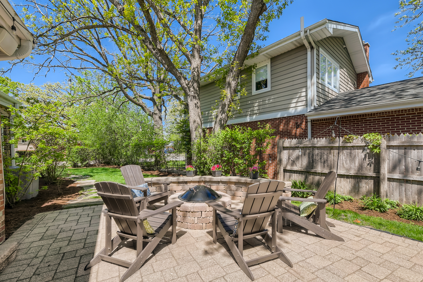 506 Warwick Road Deerfield, IL 60015 - Photo 30 of 34 a view of backyard with outdoor seating and plants
