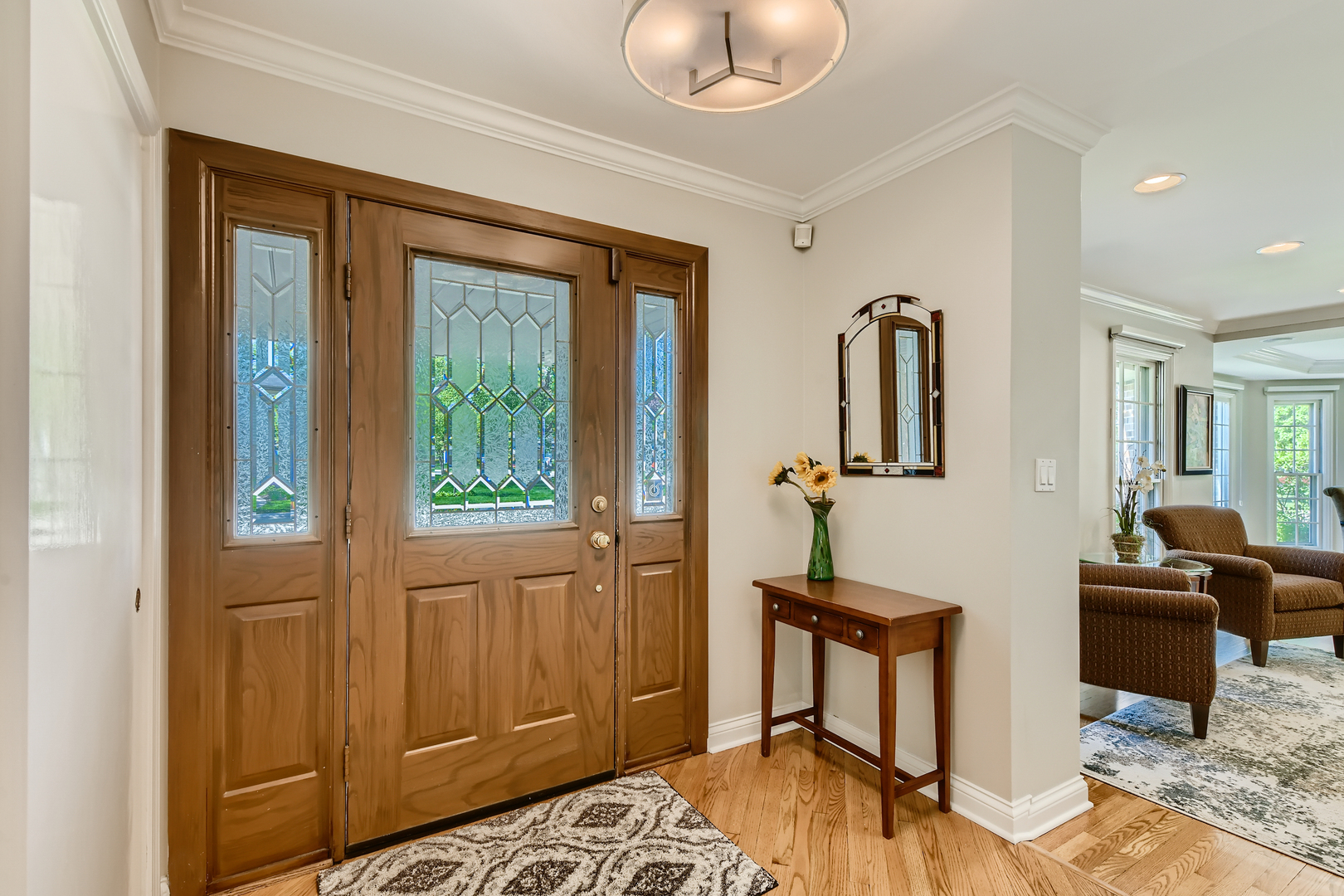 506 Warwick Road Deerfield, IL 60015 - Photo 3 of 34 a view of a livingroom with furniture and a window