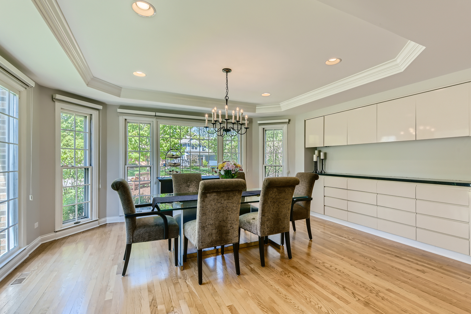 506 Warwick Road Deerfield, IL 60015 - Photo 6 of 34 a view of a dining room with furniture window and wooden floor