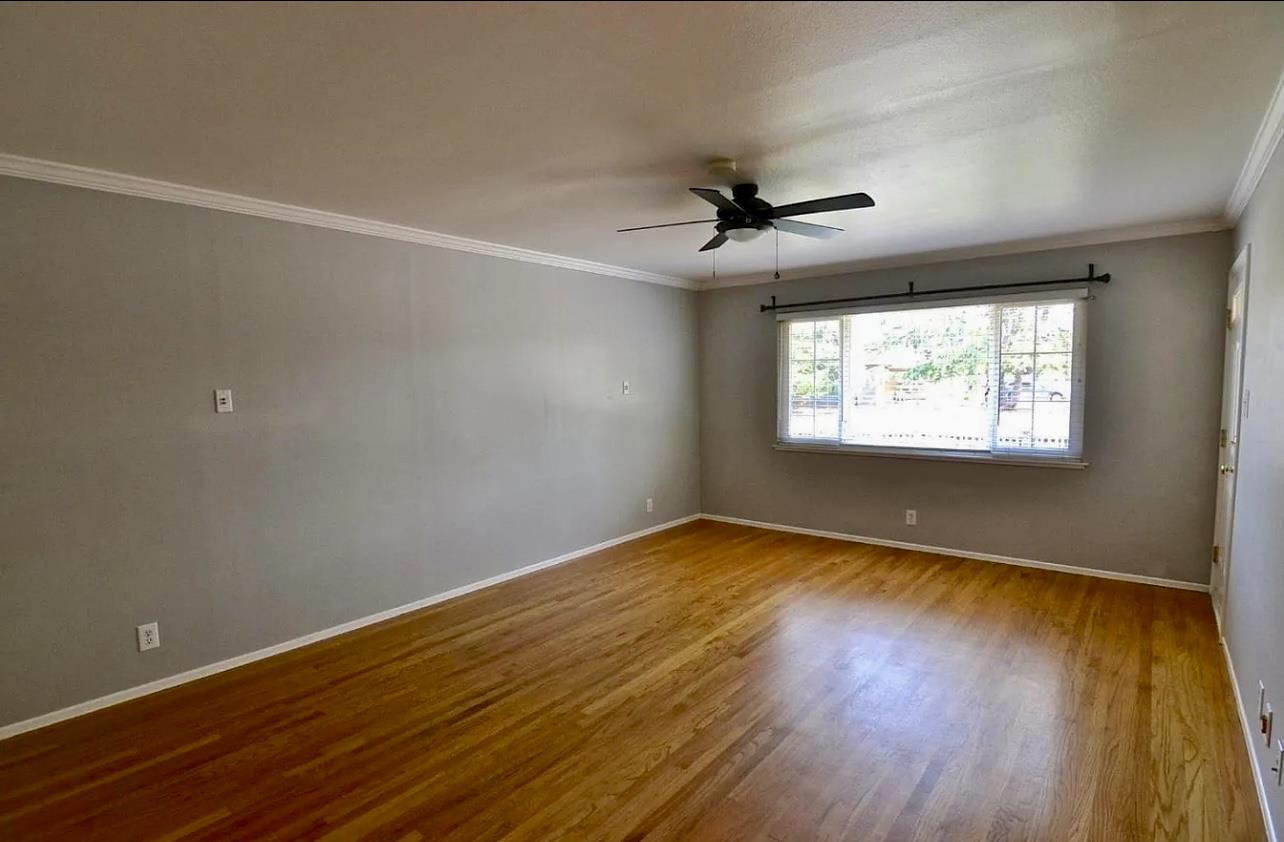 1377 Virginia Avenue Campbell, CA 95008 - Photo 11 of 29 a view of an empty room with wooden floor and a window
