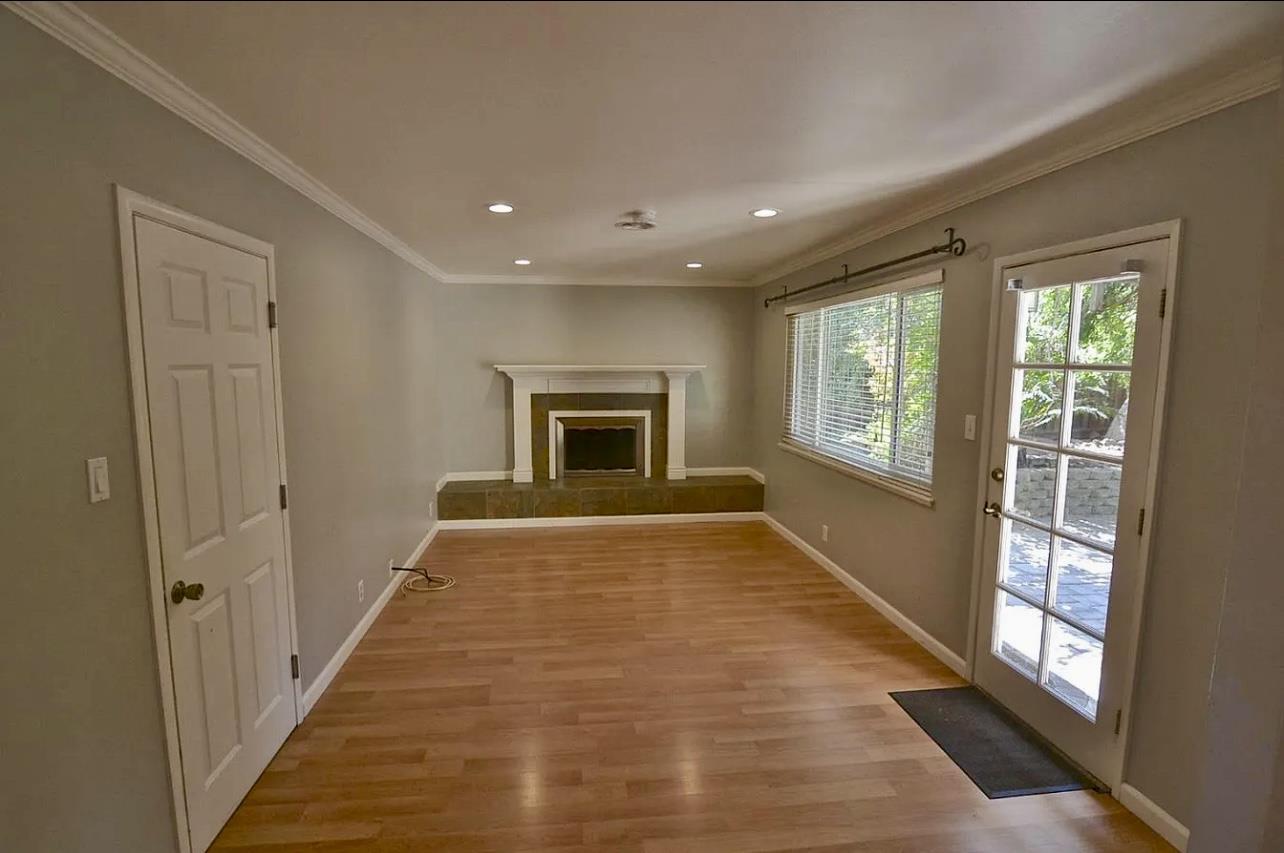 1377 Virginia Avenue Campbell, CA 95008 - Photo 12 of 29 a view of an empty room with glass door and windows
