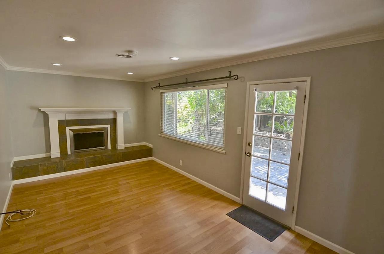 1377 Virginia Avenue Campbell, CA 95008 - Photo 14 of 29 a view of an empty room with a window and a fireplace