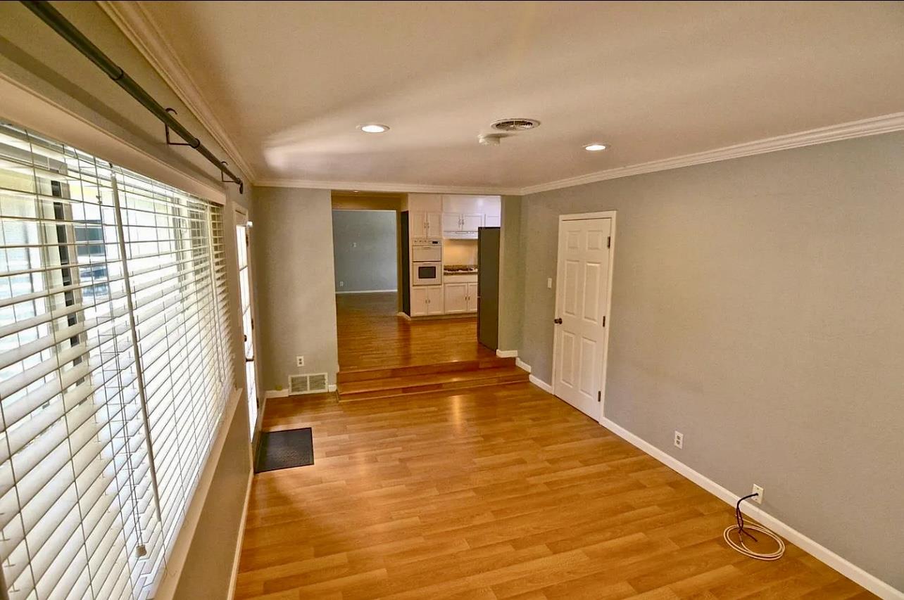 1377 Virginia Avenue Campbell, CA 95008 - Photo 15 of 29 a view of a hallway with wooden floor and a bathroom