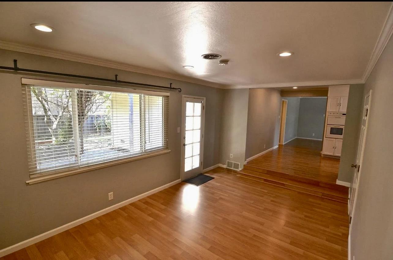 1377 Virginia Avenue Campbell, CA 95008 - Photo 17 of 29 a view of an empty room with wooden floor and a window