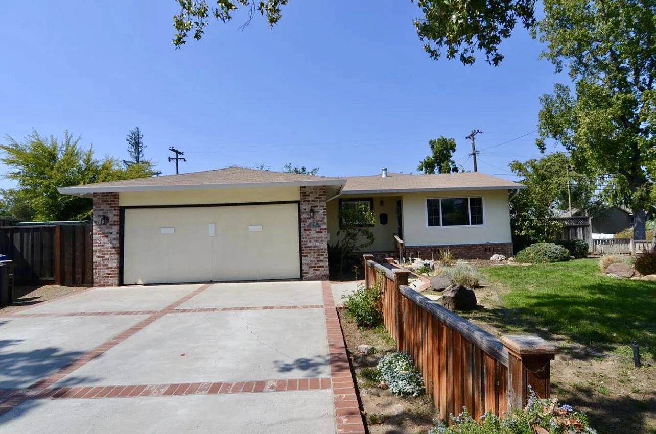 1377 Virginia Avenue Campbell, CA 95008 - Photo 2 of 29 a front view of house with yard and trees in the background