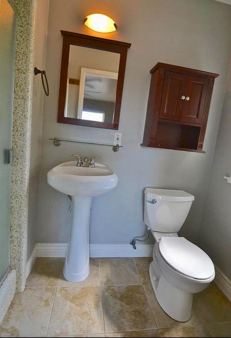 1377 Virginia Avenue Campbell, CA 95008 - Photo 21 of 29 a bathroom with a toilet sink and mirror