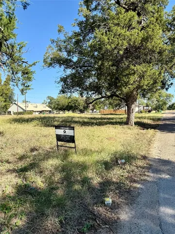a view of backyard with green space