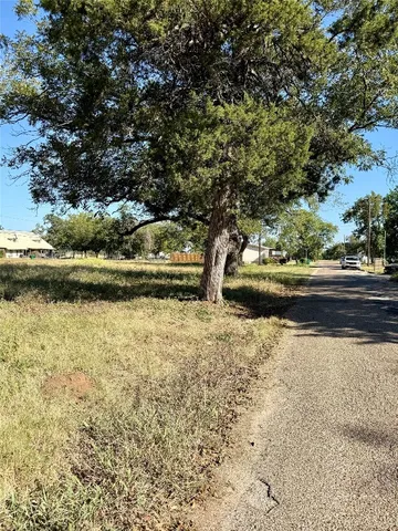 a view of yard covered with snow