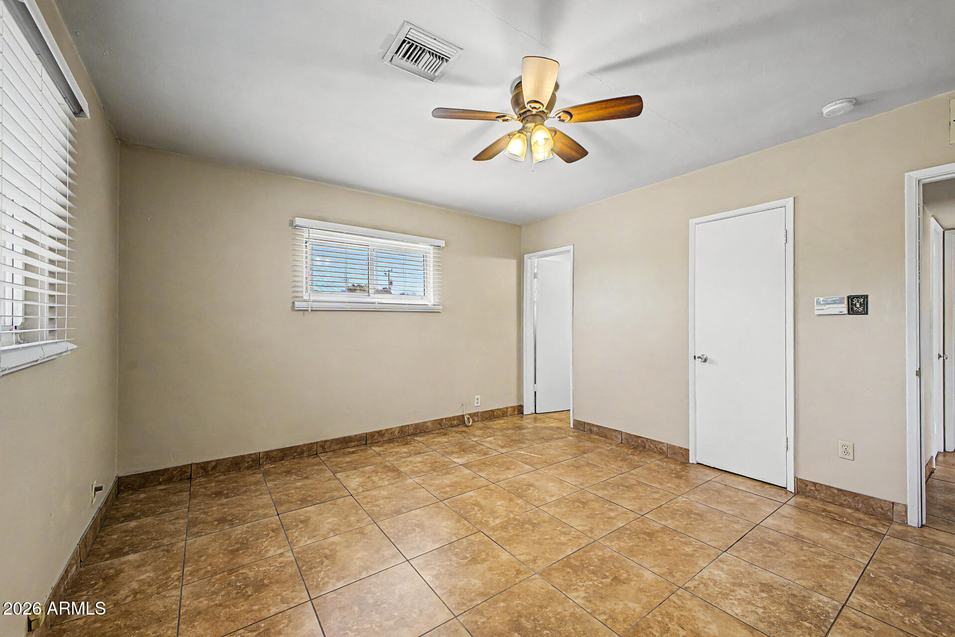 2022 East Monterey Way Phoenix, AZ 85016 - Photo 13 of 29 a view of an empty room with a window