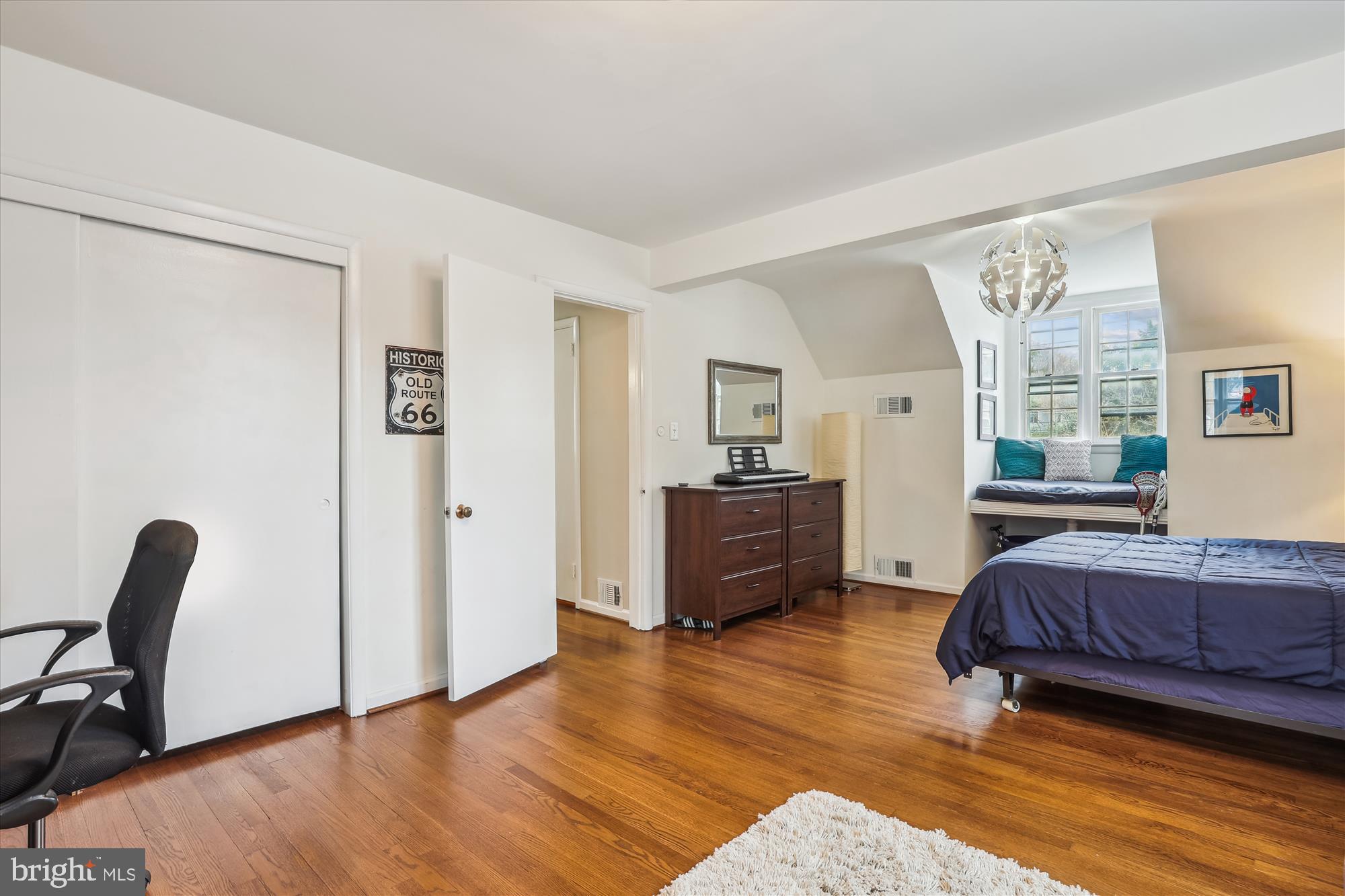 5413 Williamsburg Boulevard Arlington, VA 22207 - Photo 17 of 34 a bedroom with furniture and a window