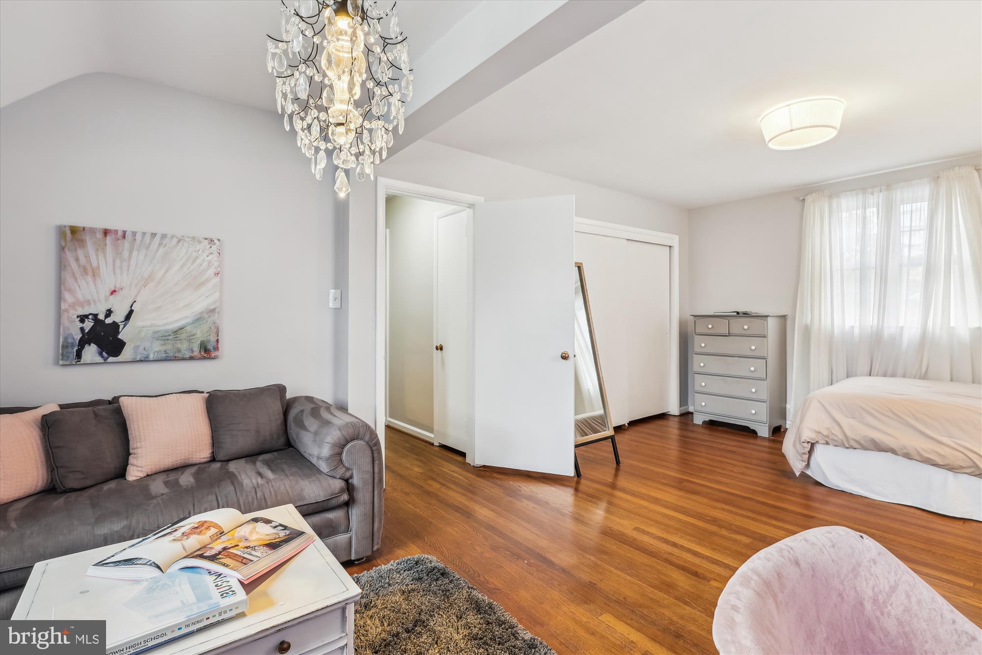 5413 Williamsburg Boulevard Arlington, VA 22207 - Photo 21 of 34 a living room with furniture and a wooden floor