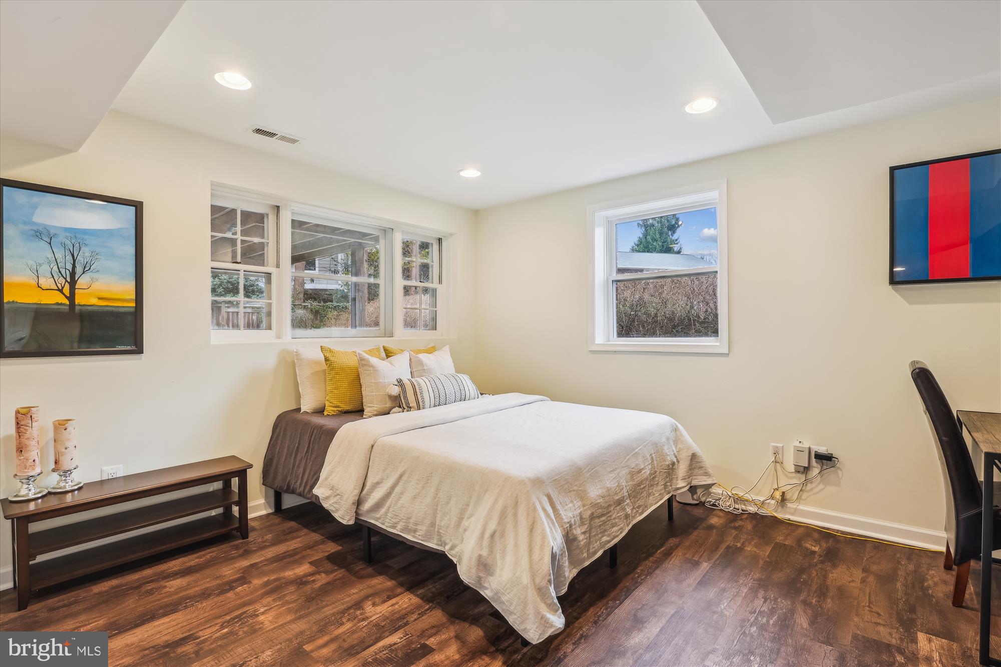5413 Williamsburg Boulevard Arlington, VA 22207 - Photo 23 of 34 a bedroom with a bed and a flat screen tv