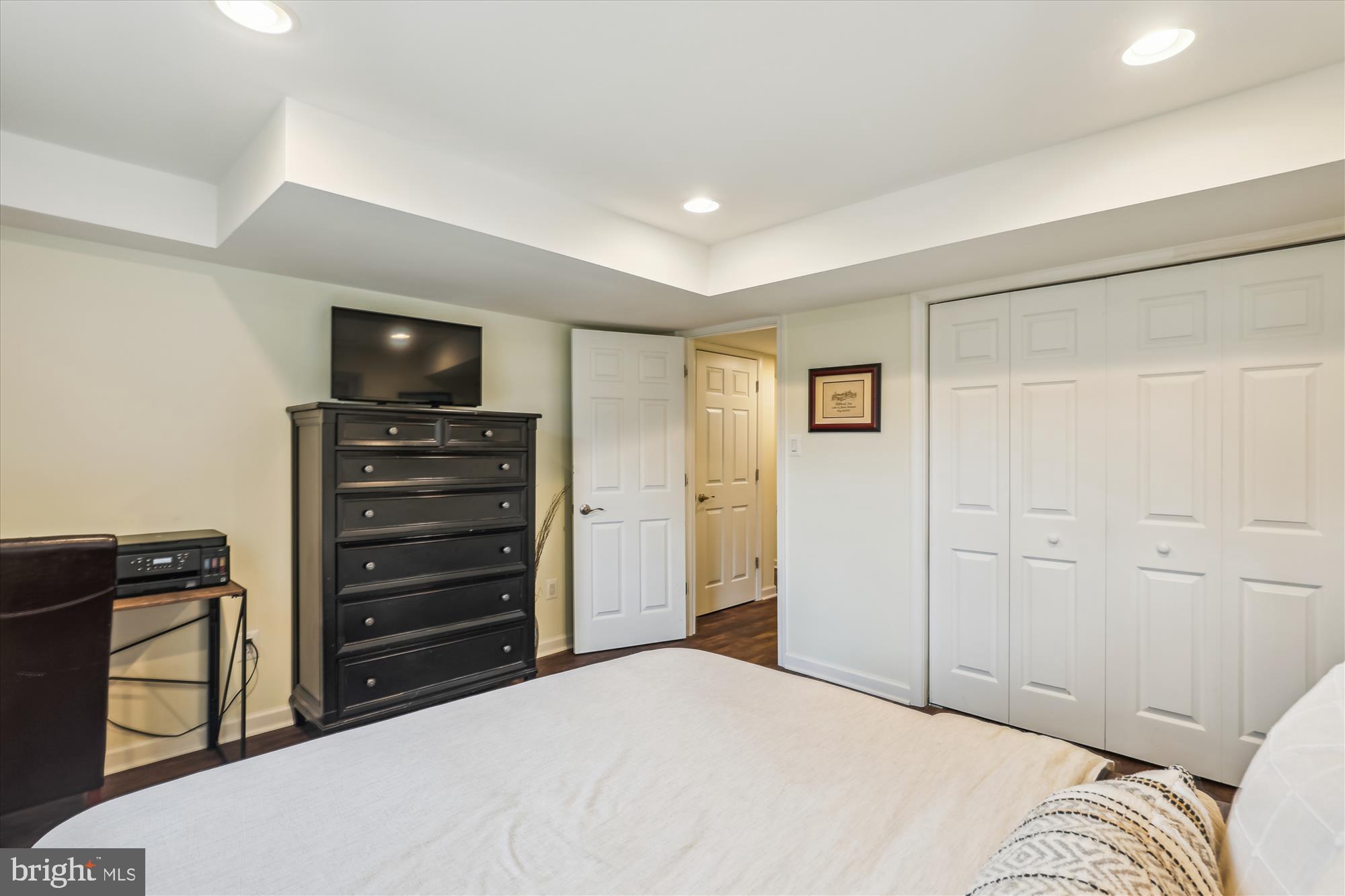 5413 Williamsburg Boulevard Arlington, VA 22207 - Photo 24 of 34 a bedroom with a bed and furniture