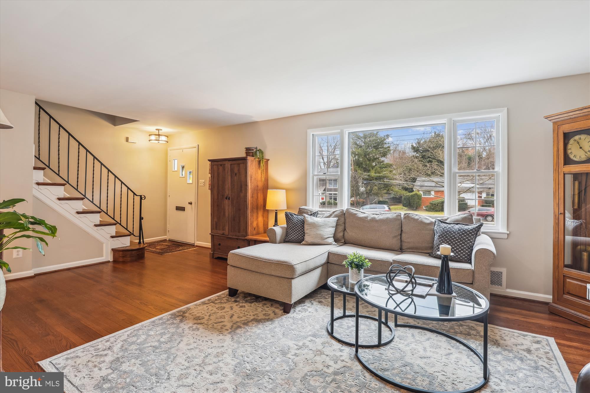 5413 Williamsburg Boulevard Arlington, VA 22207 - Photo 5 of 34 a living room with furniture and a large window