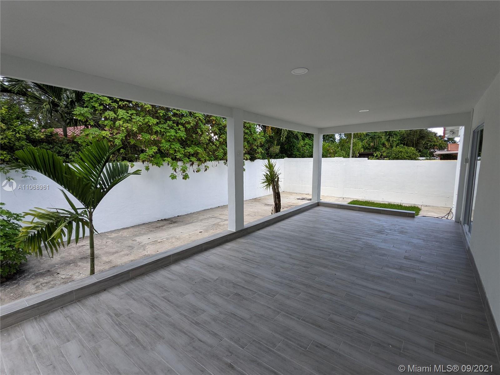 5675 Southwest 5th Street Miami, FL 33134 - Photo 20 of 20 a view of outdoor space with hardwood floor