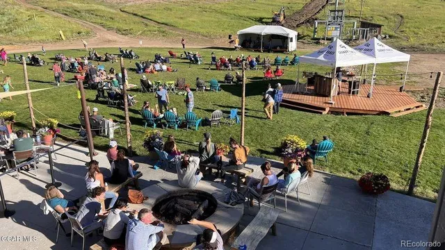 a terrace of a house with outdoor seating