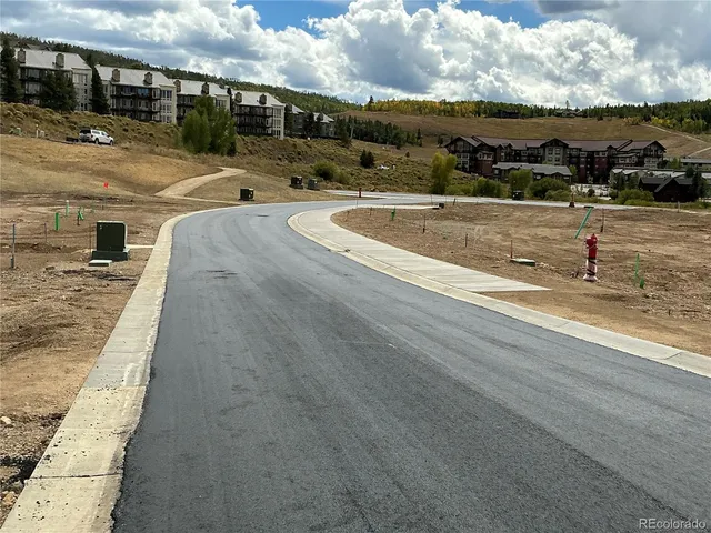 a view of a swimming pool with a terrace